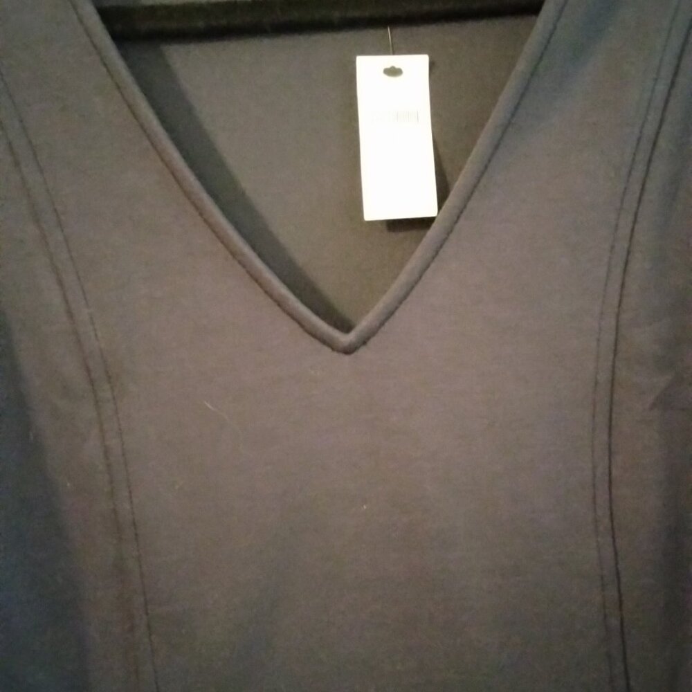 Women's navy knit top.